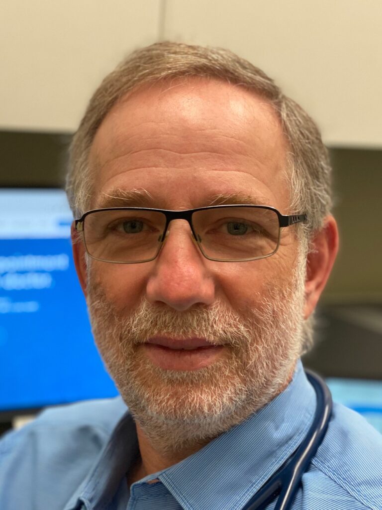 Portrait of Dr. Semion Strovski, a doctor at WELL Health